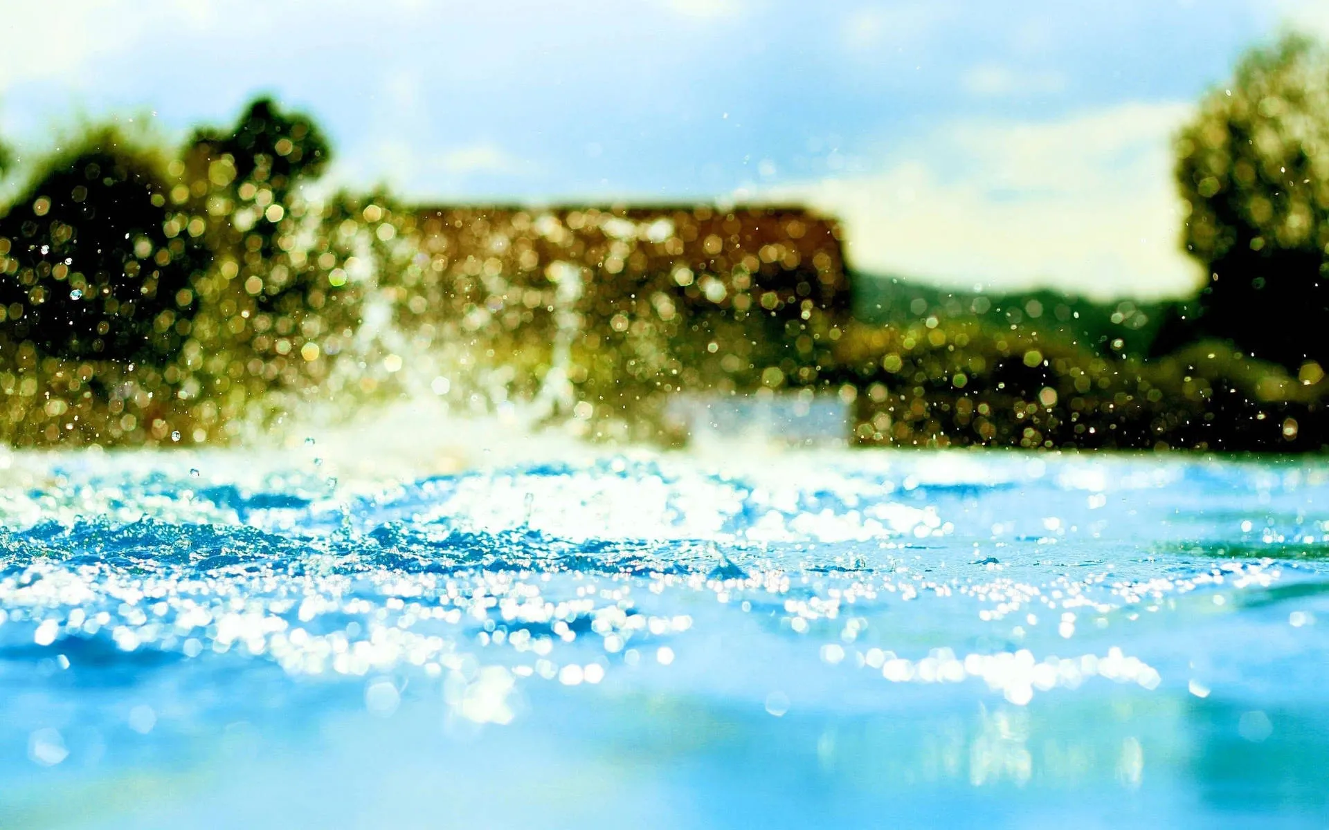 Water splashing across the H2O swimming pool mid-party